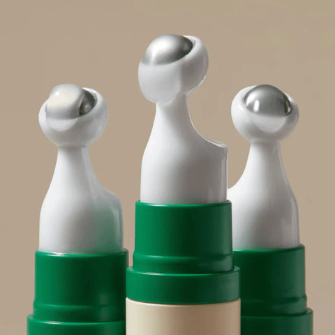 Close up of the metallic applicator of the Axis-Y Vegan Collagen Eye Serum
